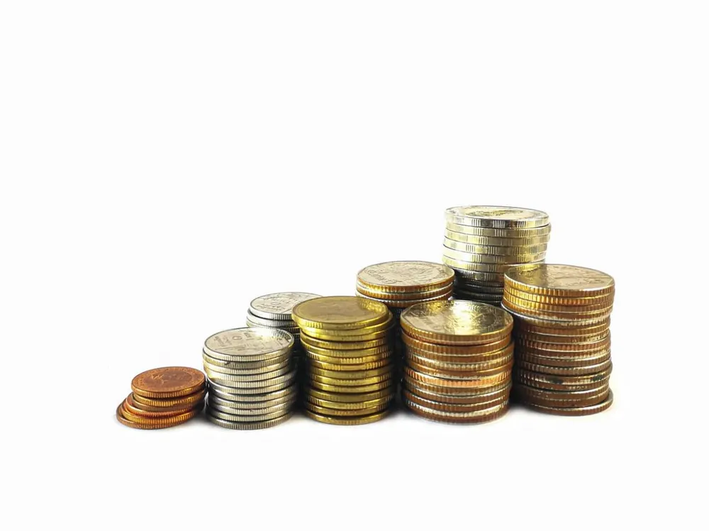 Piles de pièces de monnaie de tailles croissantes